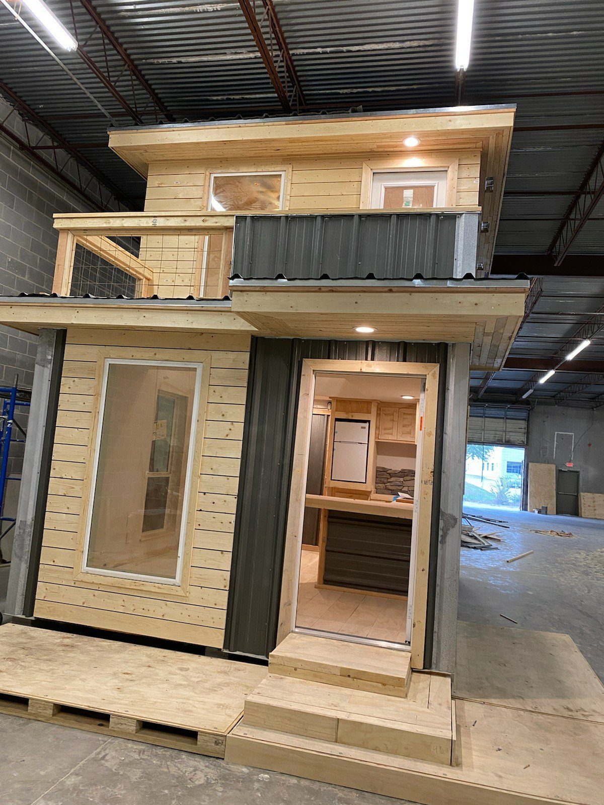 Compact tiny home build in warehouse